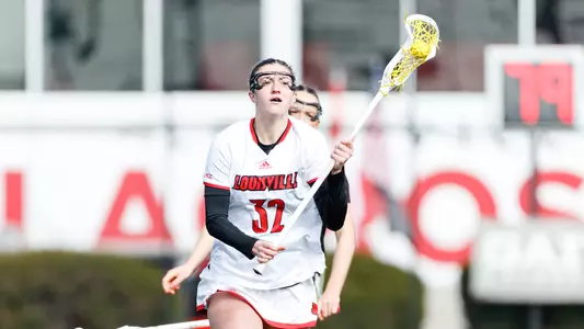 Erin Nicholson with the ball in the game against Denver