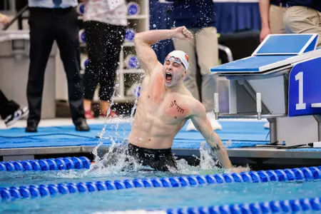 Jake Eccleston celebrates being the top seed in the 200 breaststroke