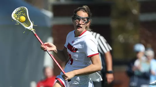 Abby Cole with the ball against North Carolina