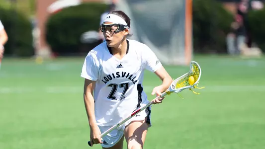Negai Nakazawa with the ball in the game against Virginia