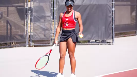 Germany Davis begins her serve