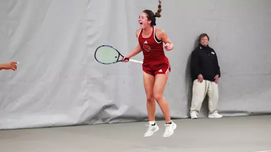 Alice Otis jumps into the air after clinching the upset over Clemson