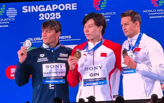 Denis Petrashov on the podium at World Championships in Singapore winning bronze