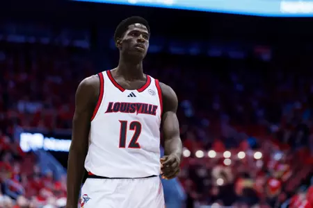 Mouhamed Camara jersey swap for signing announcement