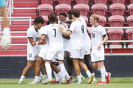 The Cardinals celebrating a goal during the game against Southern Indiana on August 21st.