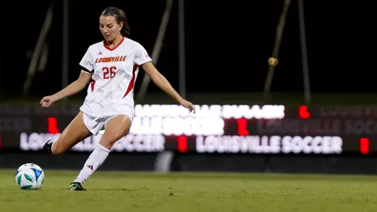 Emma Kate Schroll crosses the ball during the game against Detroit Mercy at Lynn Stadium on August 21st, 2025.