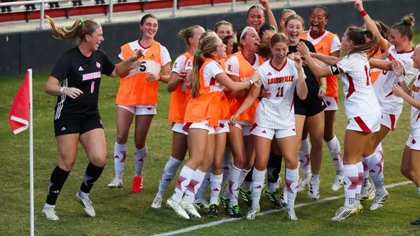 The Cardinals celebrate a goal against Clemson.