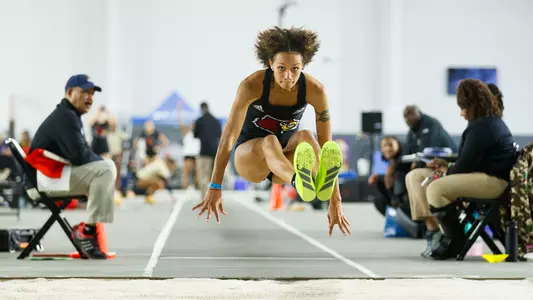 Athena Peterson long jumps at the 2026 Rod McCravy Memorial Invitational