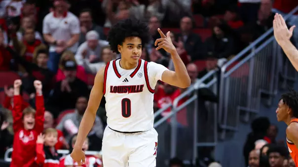 Mikel brown Jr. celebrates after hitting a 3-pointer