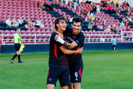 Jacopo Surricchio and Andres Escudero Martin celebrating