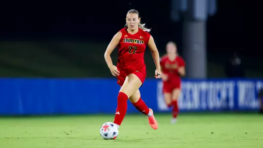 McKalie Ball moves up field with the ball at Kentucky