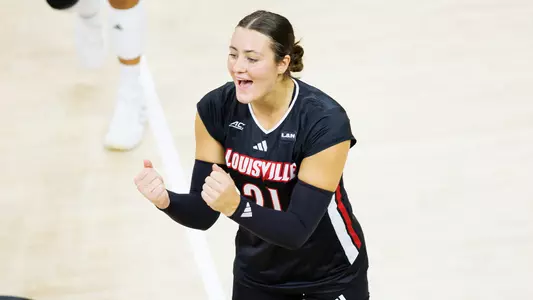 Payton Petersen celebrates a point in Louisville's win over TCU
