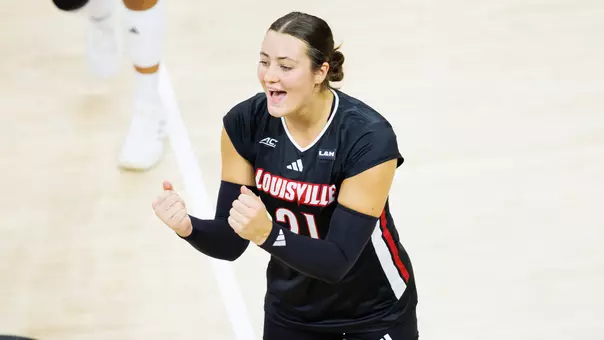 Payton Petersen celebrates a point in Louisville's win over TCU