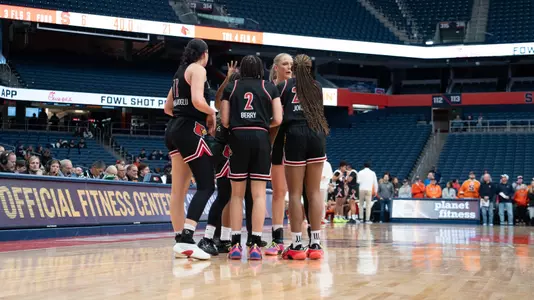 Team huddle against Syracuse