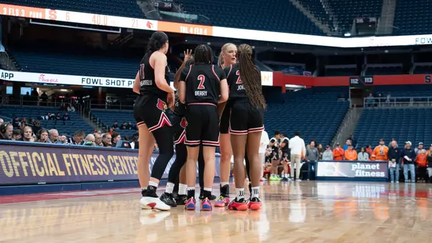 Team huddle against Syracuse
