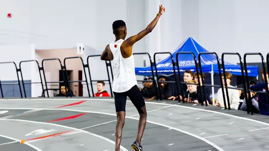 Elsingi Kipruto celebrates after winning the men's 5000m at the 2026 PNC Lenny Lyles Invitational
