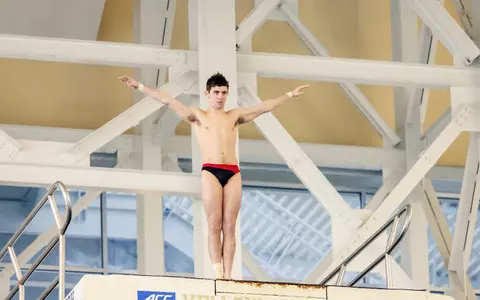Ray Preas prepares to dive off the platform