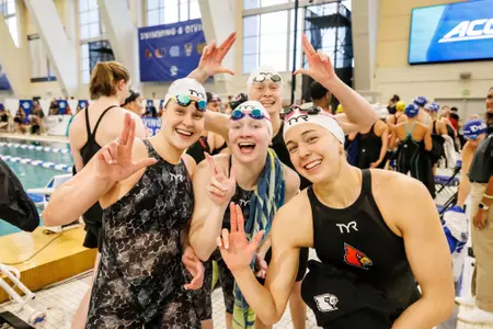 Julie Mishler, Anastasia Gorbenko, Julia Dennis and Caroline Larsen celebrate 200 MR championships