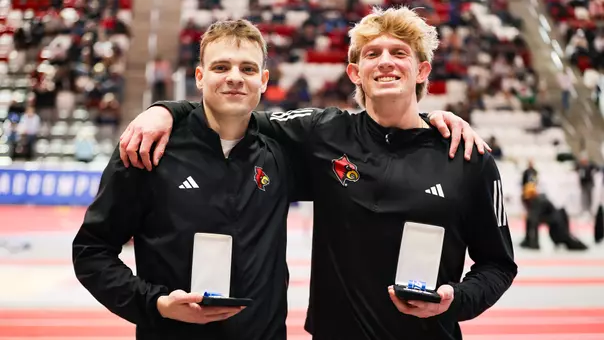 Roman Kuleshov and Miller Jones pose with medals at the 2026 ACC Indoor Championships