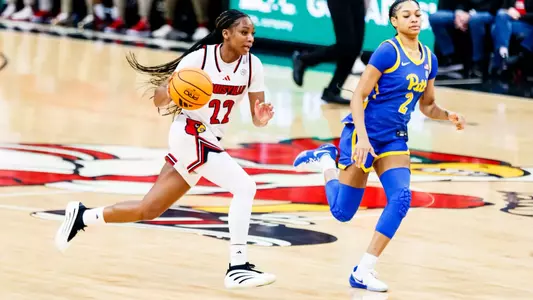 Tajianna Roberts takes the ball up court during the game against Pitt at the KFC YUM! Center on January 11th.