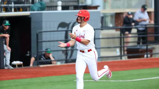 Tague Davis after a home run against Marshall.