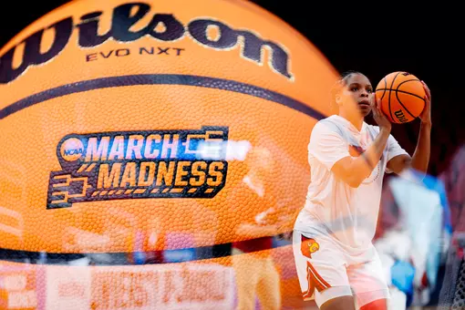 Mackenly Randolph warms up before the game against Vermont in the first round of the NCAA tournament at the KFC Yum! Center on March 21.