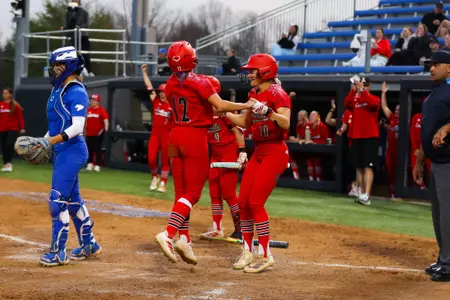 Chelsea Mack and Easton Lotus celebrating at Kentucky