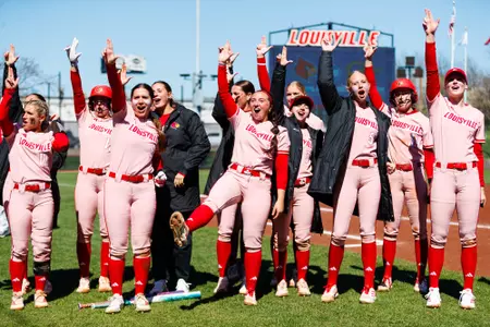 The Cards celebrate the win after the game against Georgia Tech at Ulmer Stadium on March 28.