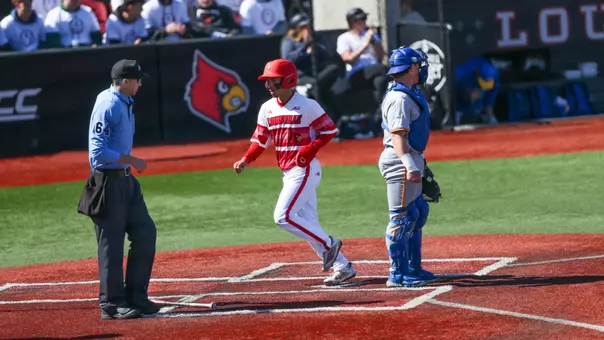 Alex Alicea scoring a run against Pitt.