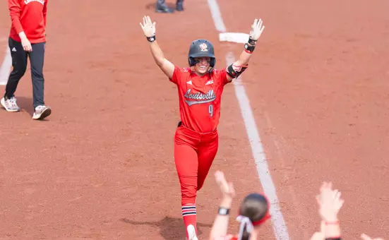 Camryn Lookadoo celebrates after a home run against ND.