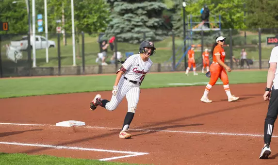 Bri Despines celebrates grand slam against Syracuse.