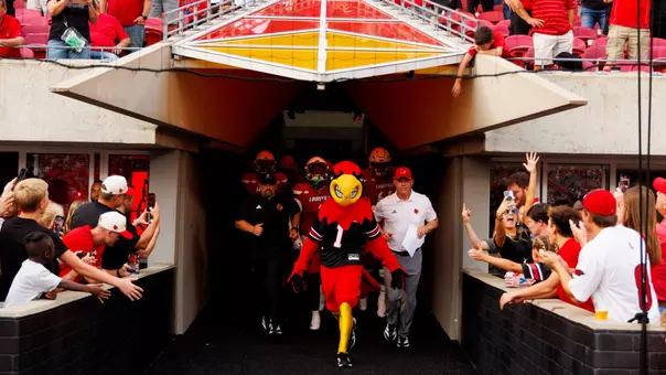 The Cardinals run out of the tunnel.