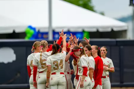 Cards huddle up before ACC Tournament game.