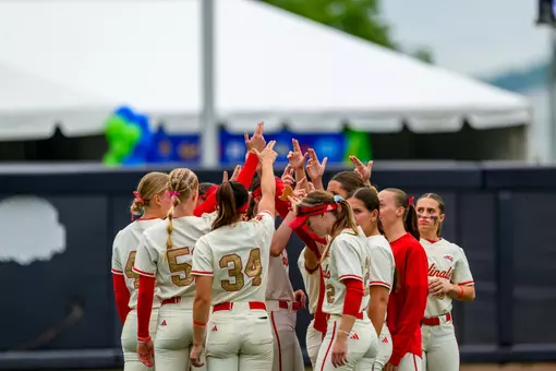 Cards huddle up before ACC Tournament game.