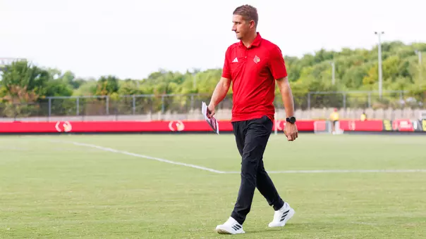 John Michael Hayden walks out onto the pitch