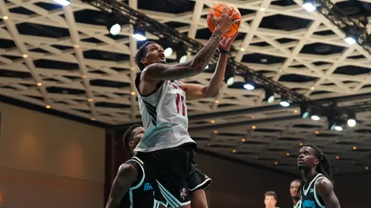 De'Shayne Montgomery goes up for a layup against Bahamas Raw Talent team in Baha Mar Hoops Summer League