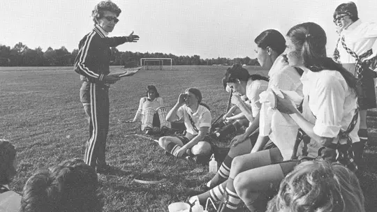 Field Hockey Coach Sherrill Brakmeier address the team in an undated photo