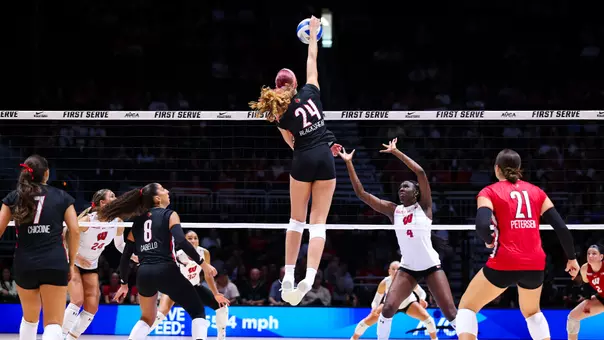 Kalyssa Blackshear kills the ball vs. Wisconsin at the AVCA First Serve.