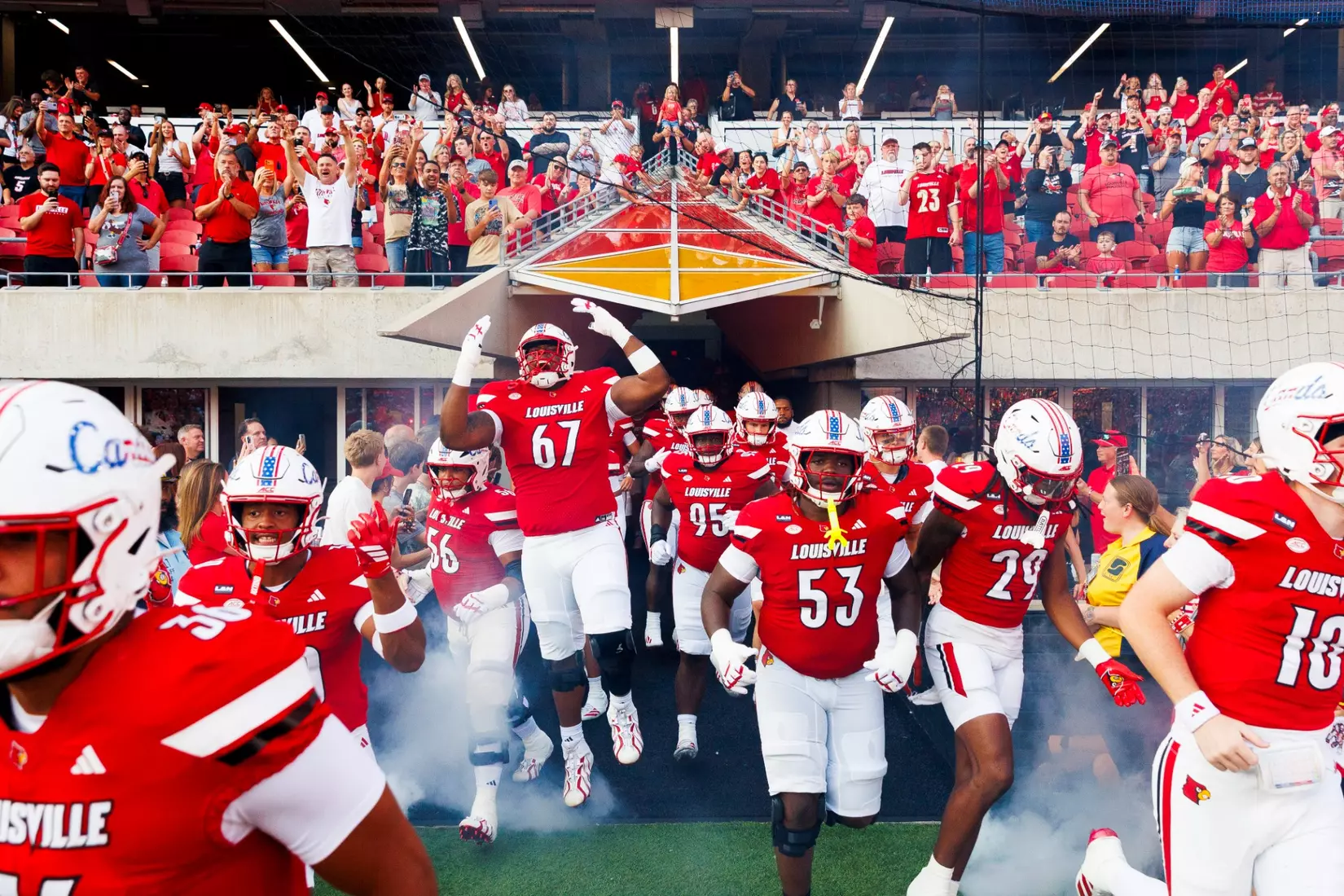 The Cards runout before the game against Villanova at L&N Stadium on September 11.