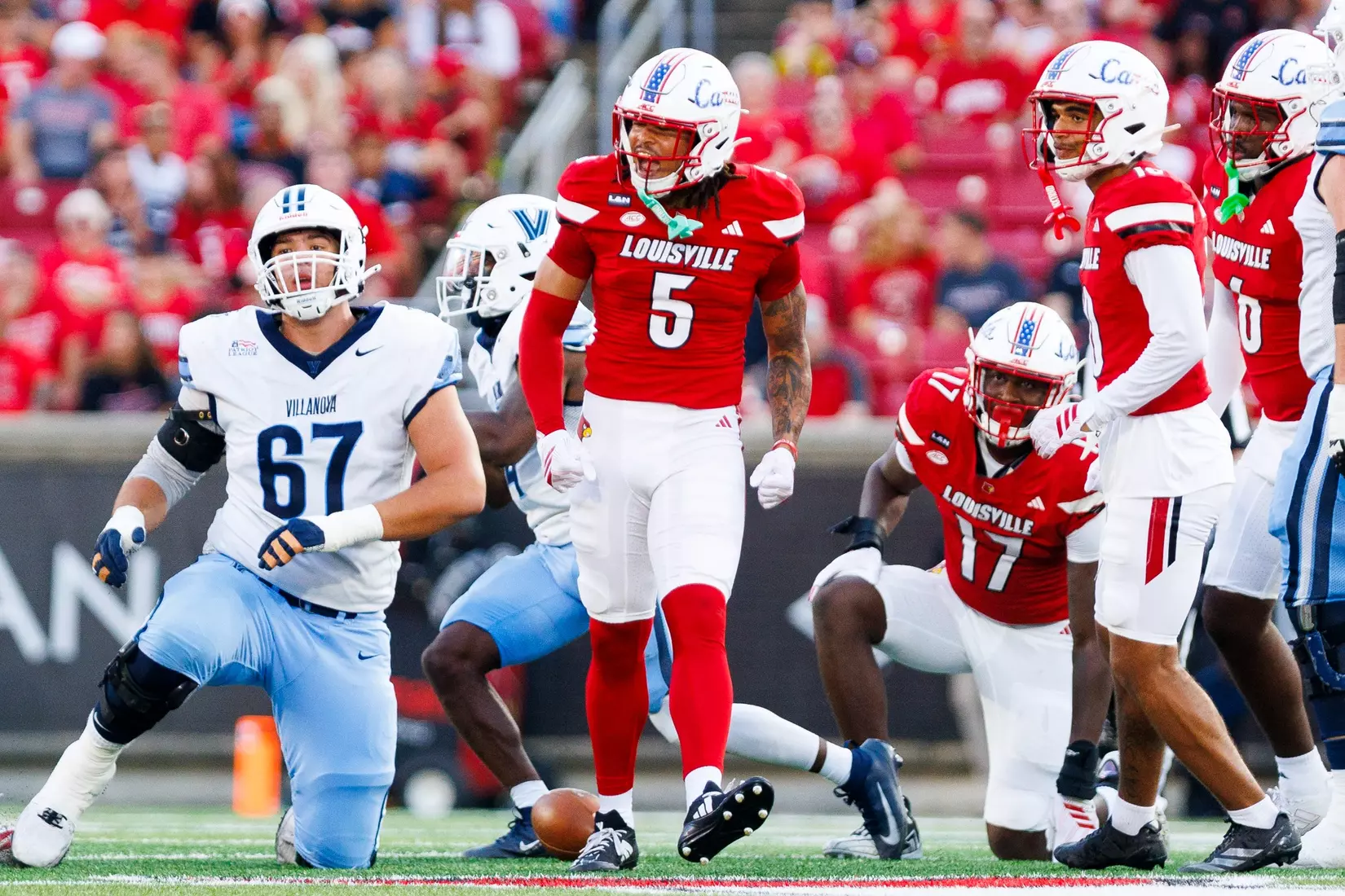 Keyjuan Brown celebrates during the game against Villanova at L&N Stadium on September 11.