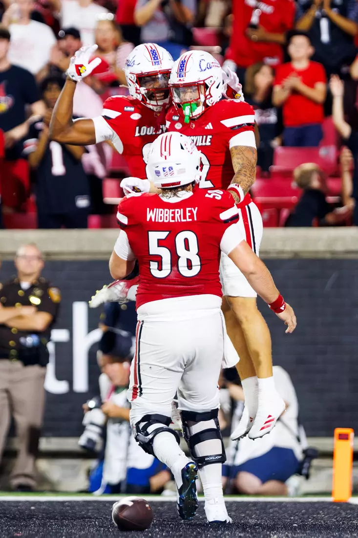 Braxton Jennings and Elizjah Lewis celebrate during the game against Villanova at L&N Stadium on September 11.
