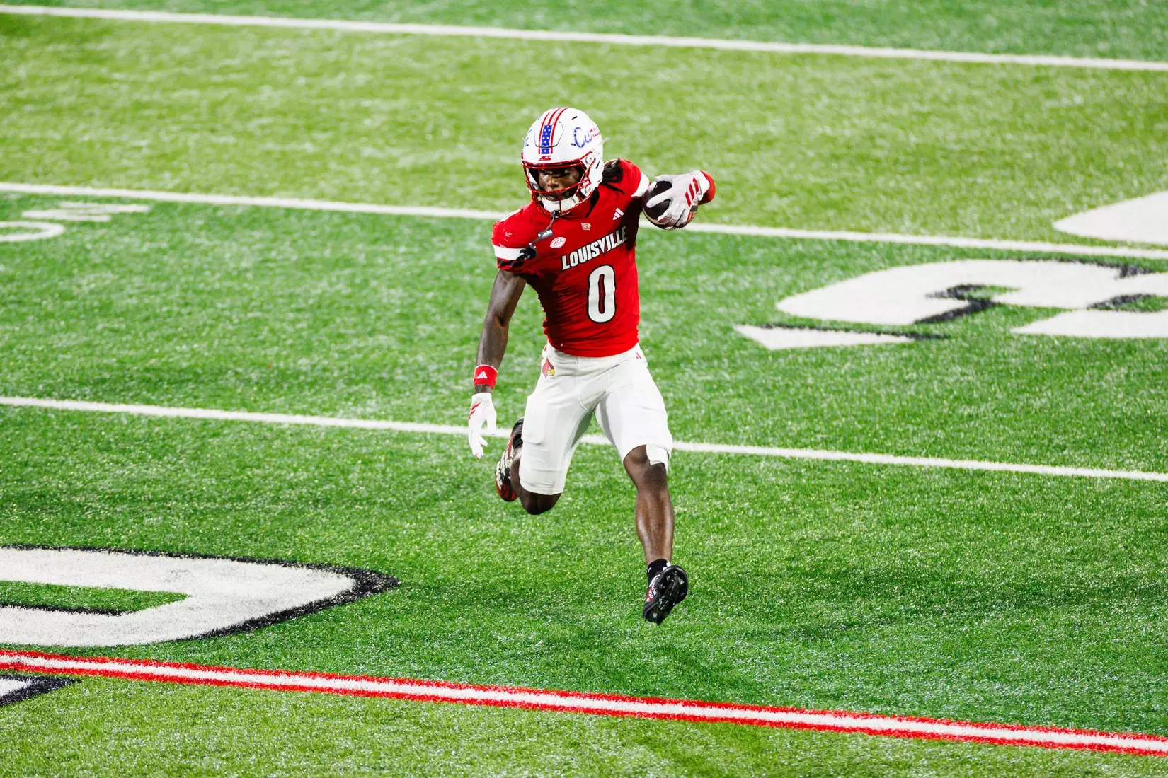 Tre Richardson runs the ball during the game against Villanova at the L&N Stadium on September 11.