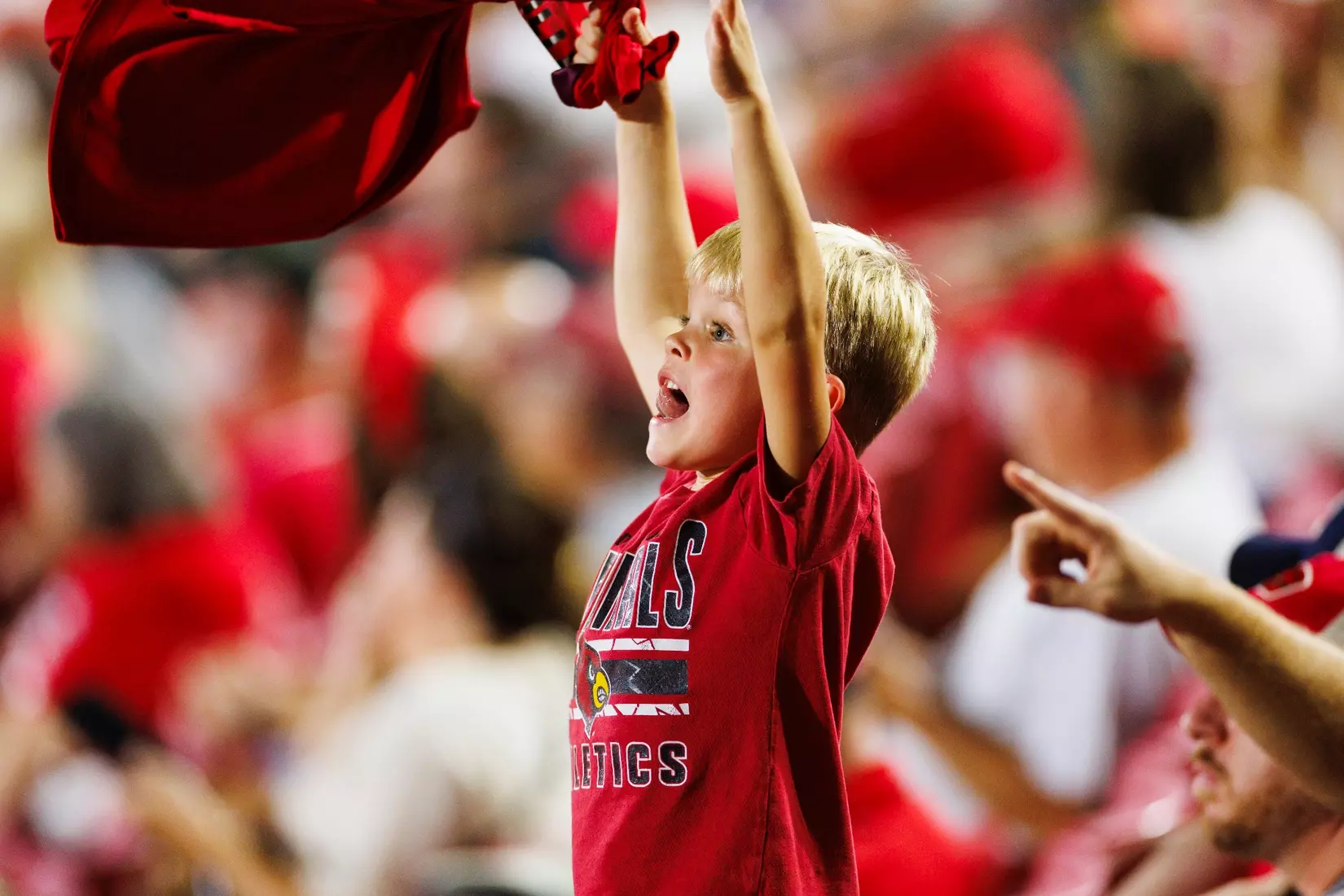 A fan cheers during the game against Villanova at the L&N Stadium on September 11.