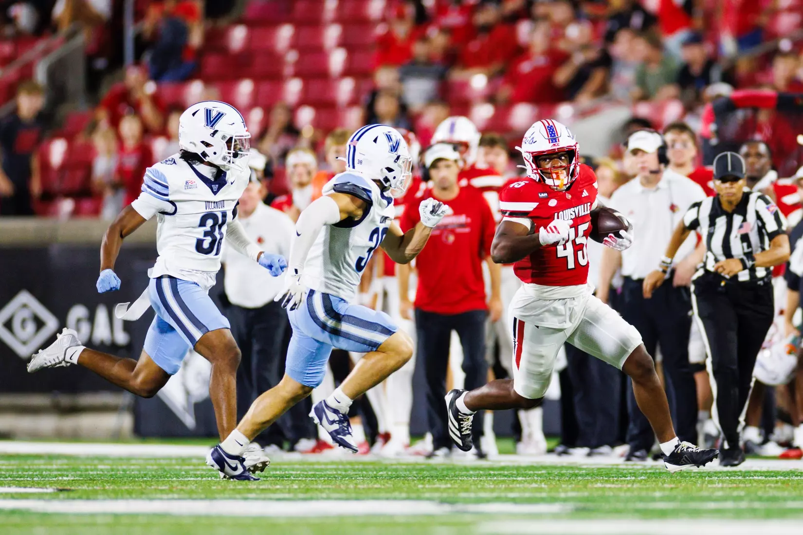 Marlon Harbin runs the ball during the game against Villanova at the L&N Stadium on September 11.