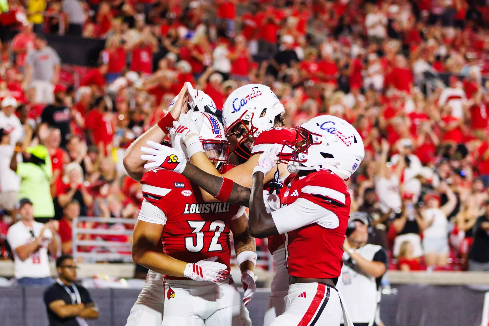 The Cards celebrate during the game against Villanova at the L&N Stadium on September 11.