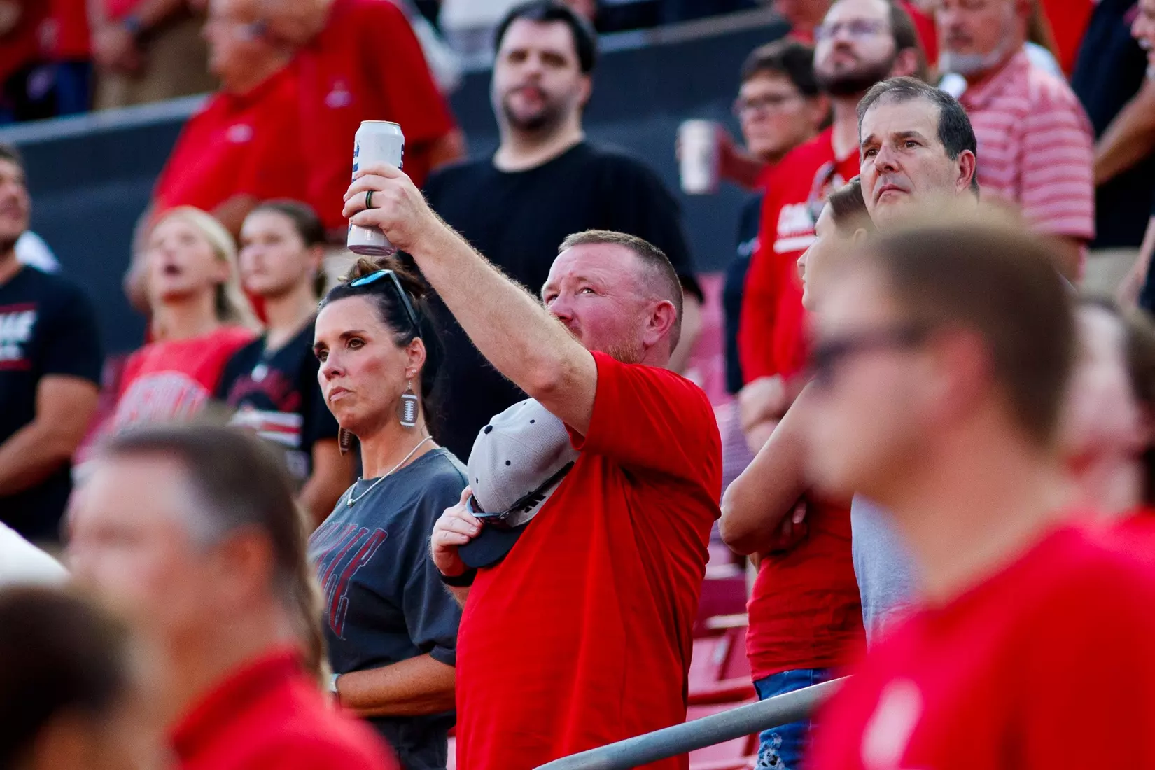 A fan during the moment of silence to remember 9/11 before the game against Villanova at L&N Stadium on September 11.