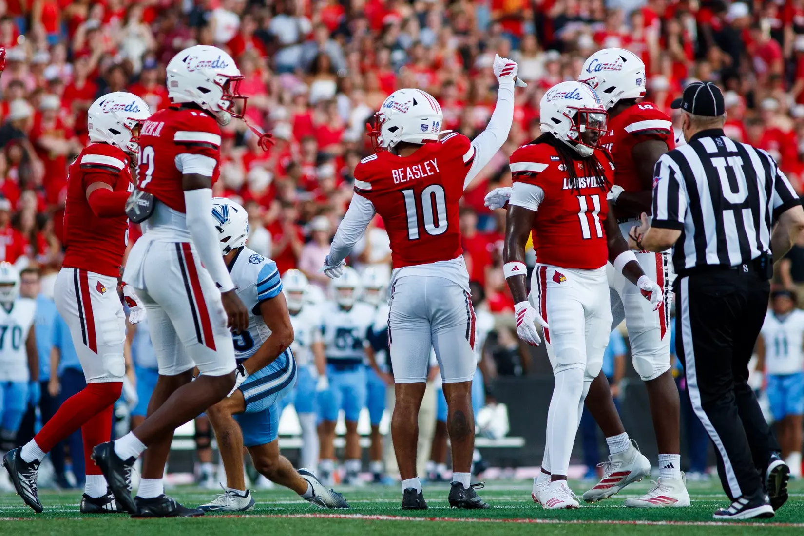 Kaleb Beasley celebrating a fourth down stop during the game against Villanova at L&N Stadium on September 11.