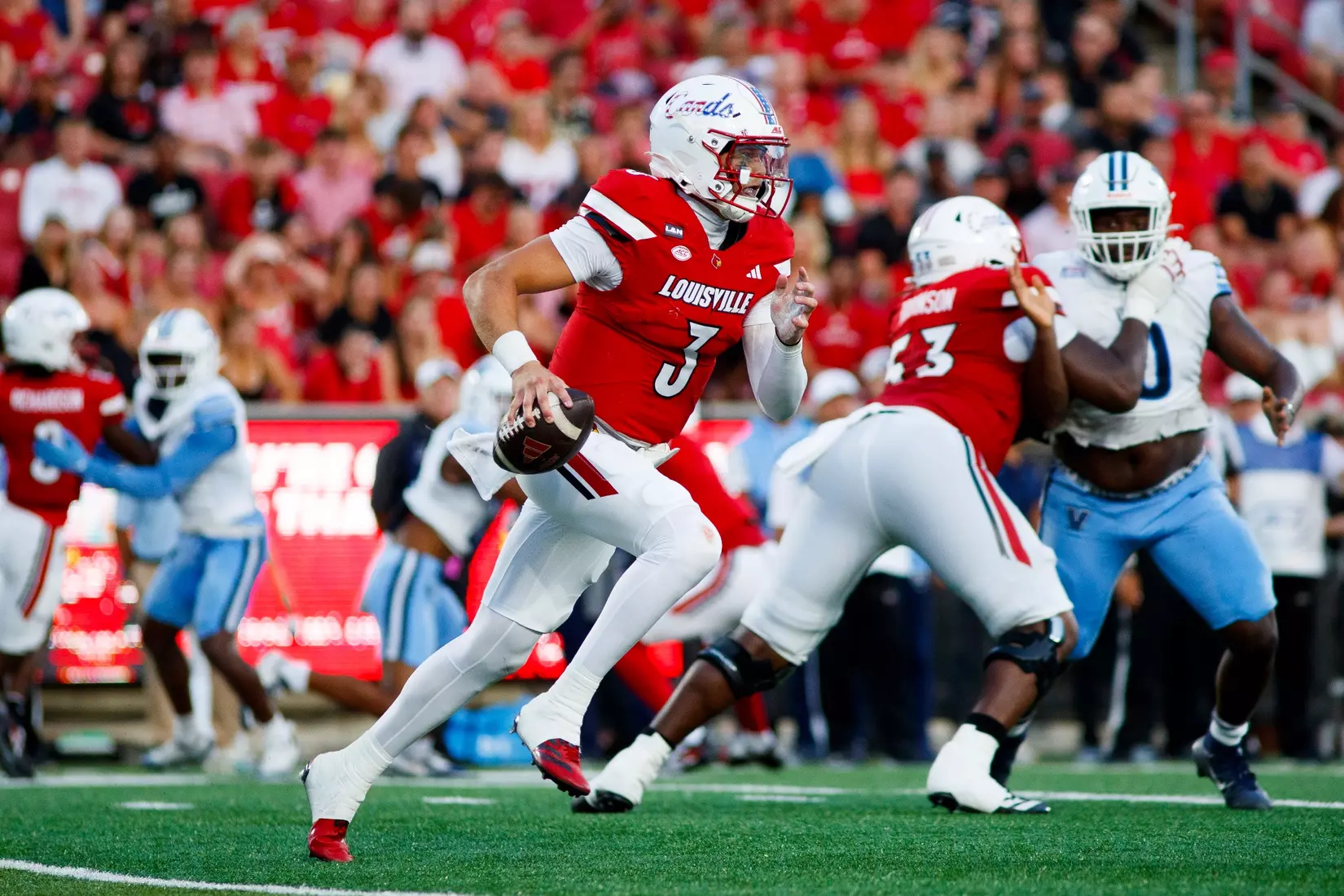 Lincoln Kienholz scrambling during the game against Villanova at L&N Stadium on September 11.