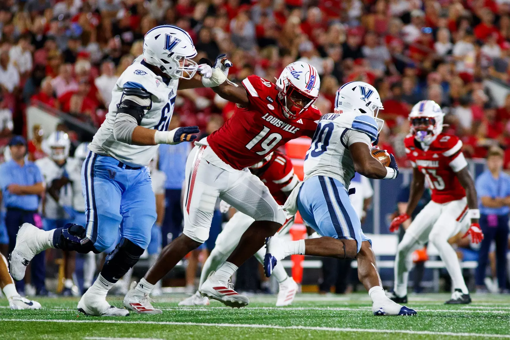 Micah Carter making a tackle during the game against Villanova at L&N Stadium on September 11.