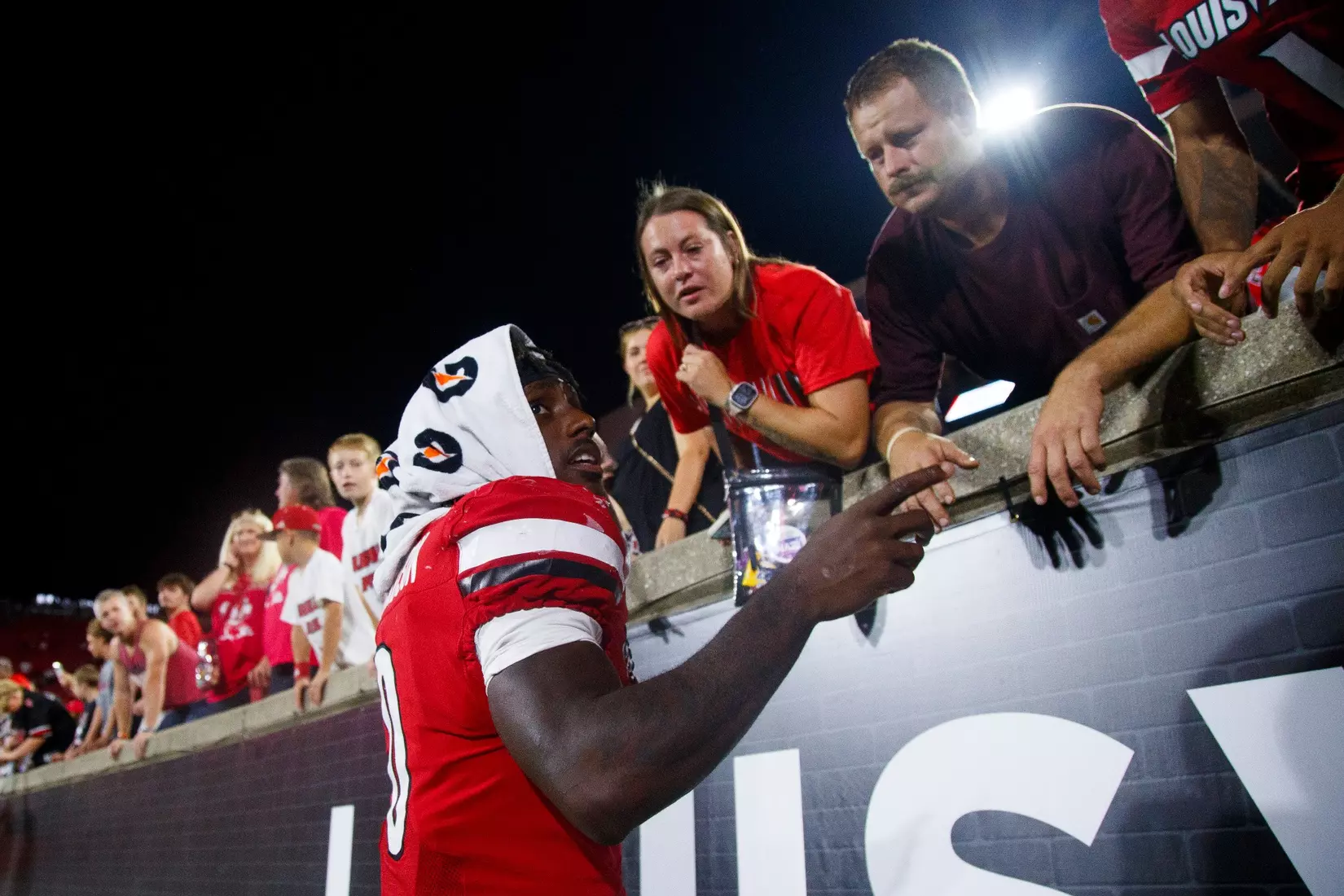 Tre Richardson interacting with fans after the game against Villanova at L&N Stadium on September 11.